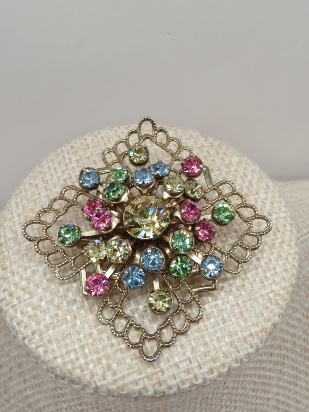 Vintage Rhinestone Cluster UV Reactive Gold Tone Filigree Brooch